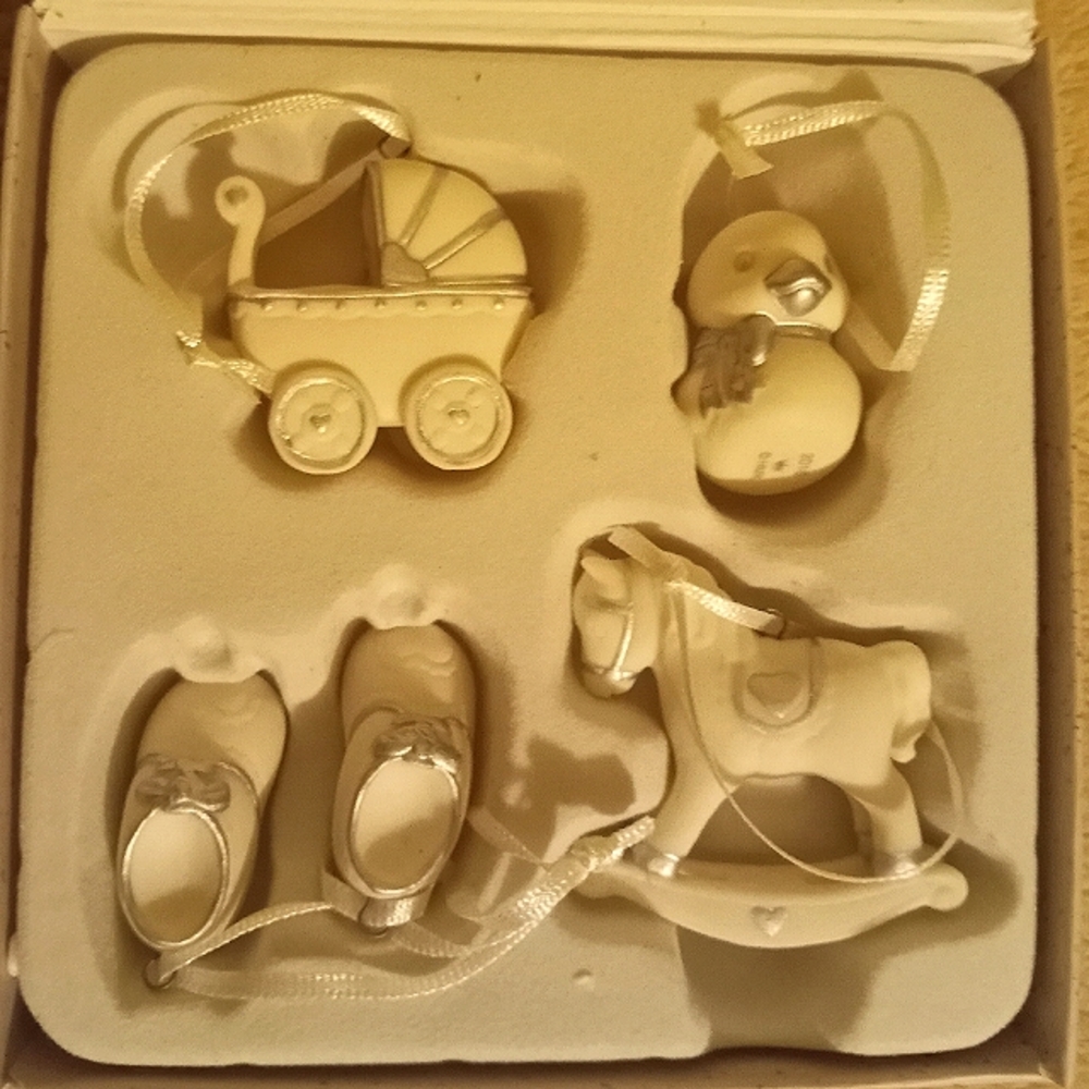 Hallmark Keepsake "Welcome Baby Ornament Set". 4 miniature porcelain ornaments.